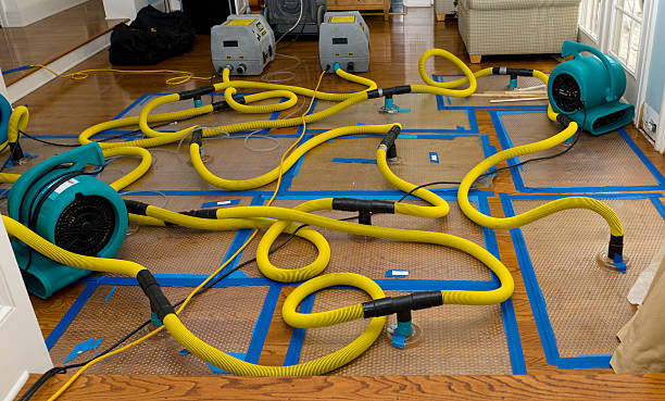 Professional Flood Damage Restoration technician working in Canton, GA